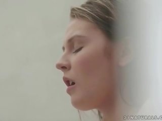 Delightful teen masturbating in the shower
